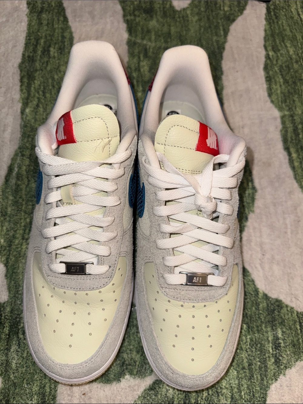 Nike Low Top Sneakers in Off-White, Blue & Red Accents